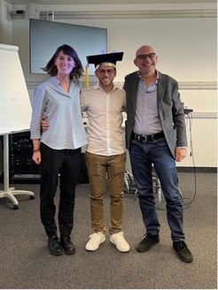 Andreas (centre) with his supervisors, Claire Donnelly (left) and Valerio Scagnoli (right) after his successful PhD defence.